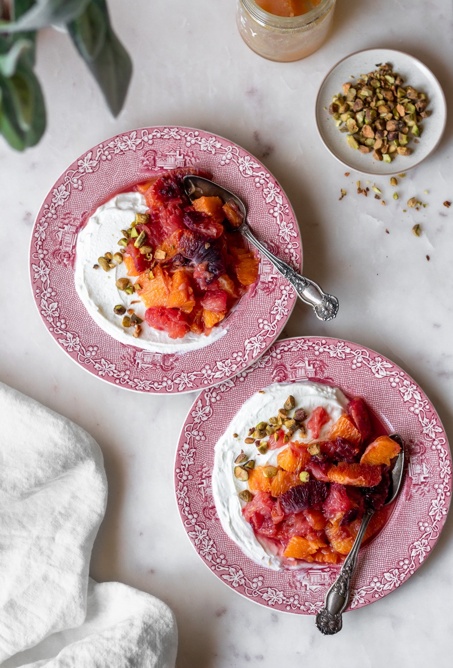 Greek yogurt with orange compote and pistachios.