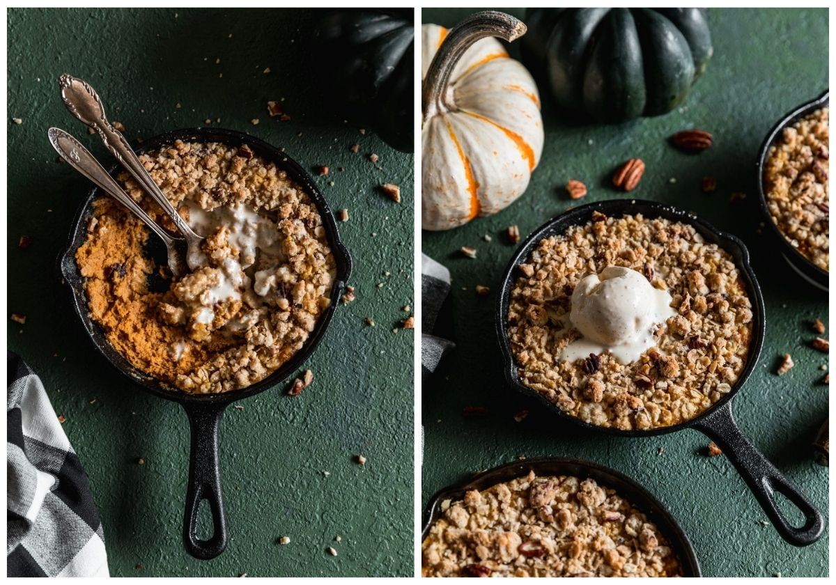 Two images; on the left, a closeup image of a half eaten pumpkin crisp in a mini skillet on a dark green background next to a black and white checkered linen. On the right, a side image of a crisp with melted ice cream next to two more crisps, crumbled pecans, and a white and orange pumpkin and a black pumpkin.