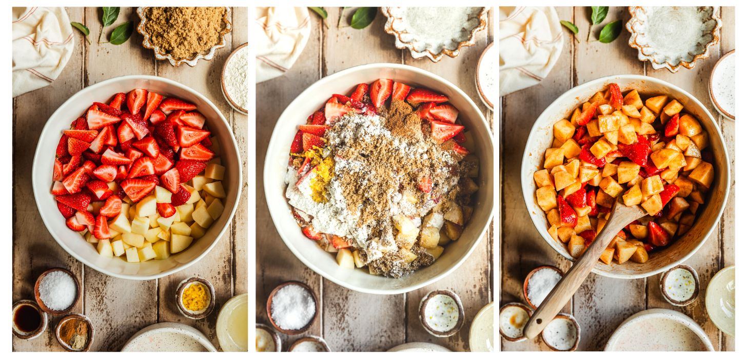Three steps to making crumble. In photo 1, a white bowl of apples and strawberries on a wood table next to brown and white bowls of brown sugar, flour, salt, vanilla, lemon zest, and spices. In photo 2, the fruit is topped with brown sugar, flour, and spices. In photo 3, the filling is combined.
