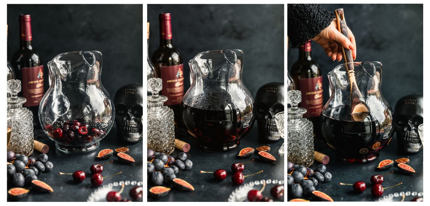 Three steps to making a wine cocktail. In photo 1, a pitcher with cherries, blackberries, and grapes on a black table next to alcohol bottles, grapes, figs, a bottle of wine, and a black skeleton. In photo 2, the pitcher has wine and juice in it. In photo 3, a woman's hand stirs the cocktail.