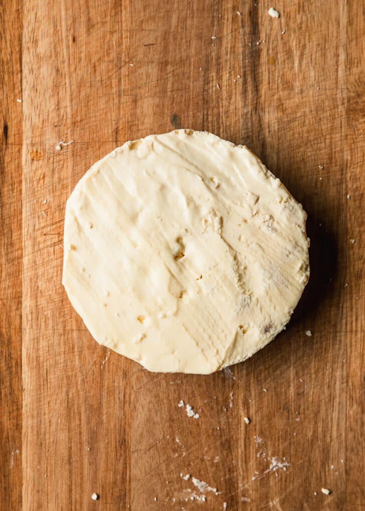 Brie on a wood board.