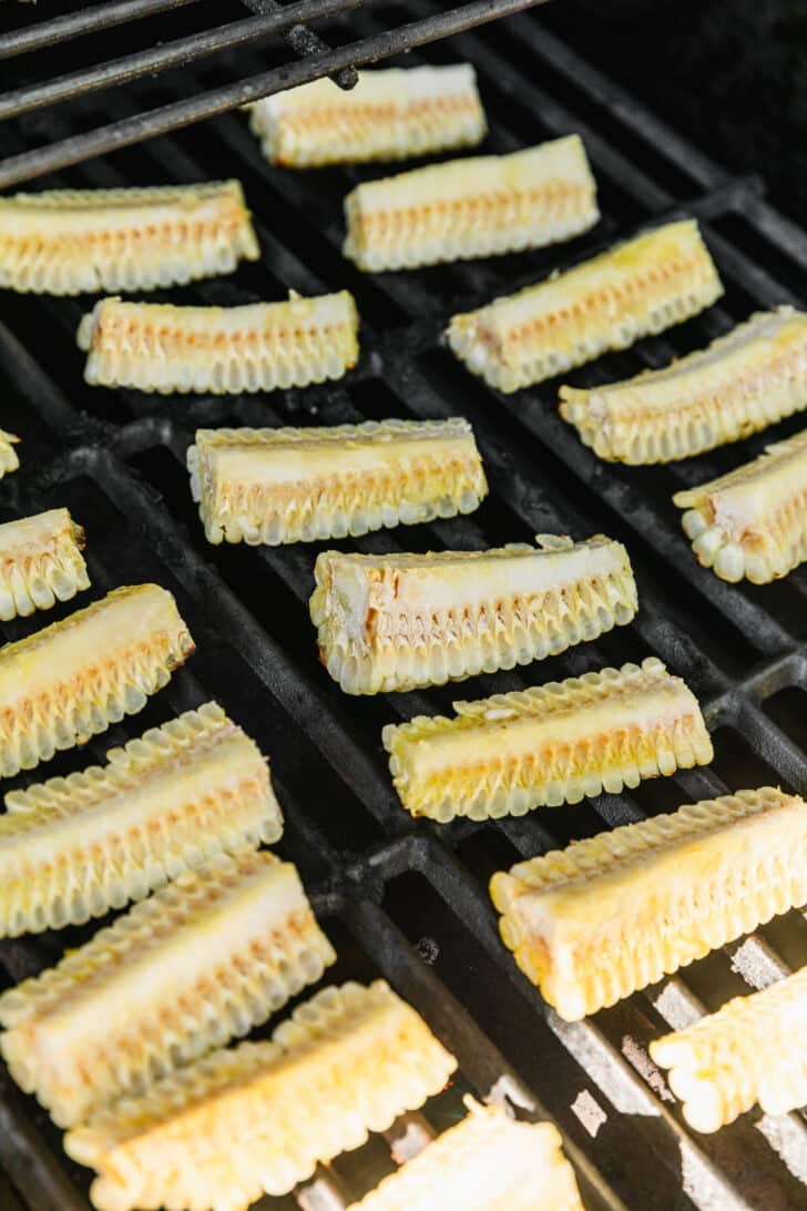 Corn ribs on a grill.