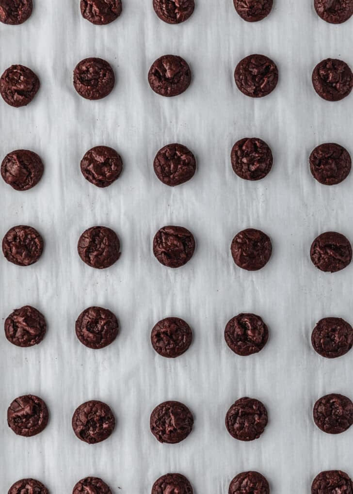 A pan of mini chocolate brownie crinkle cookies.
