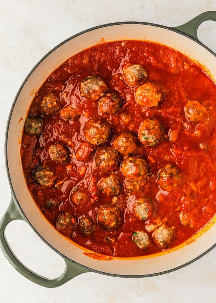 A white pot of Spanish meatballs for tapas.